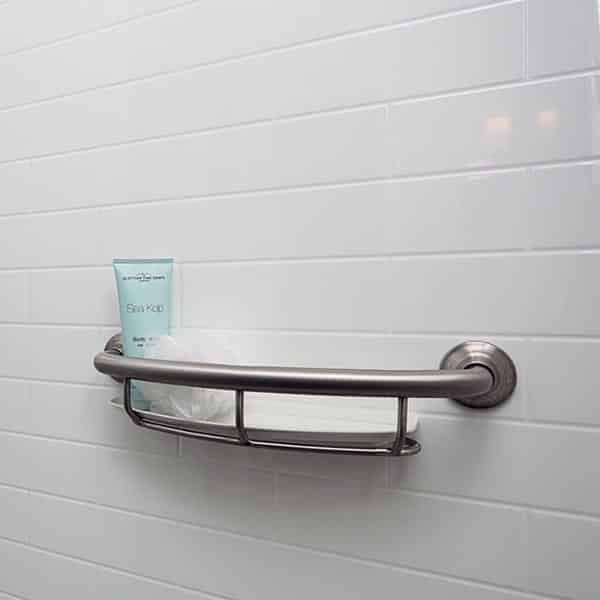 Subway tile solid surface grout free wall panels with a curved shower basket 