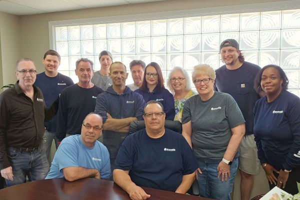 Innovate Building Solution employees group photo in the office