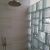 Professionally installed glass block shower with multiple patterns and sizes in Avon Lake Ohio - The Bath Doctor 