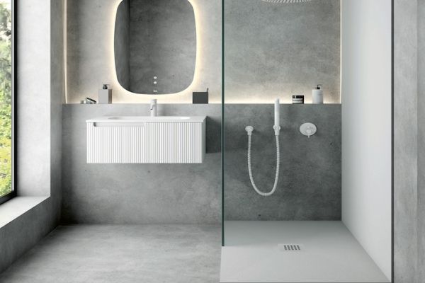 Shower pan in a white marble pattern which includes a ABS drain and drain cover