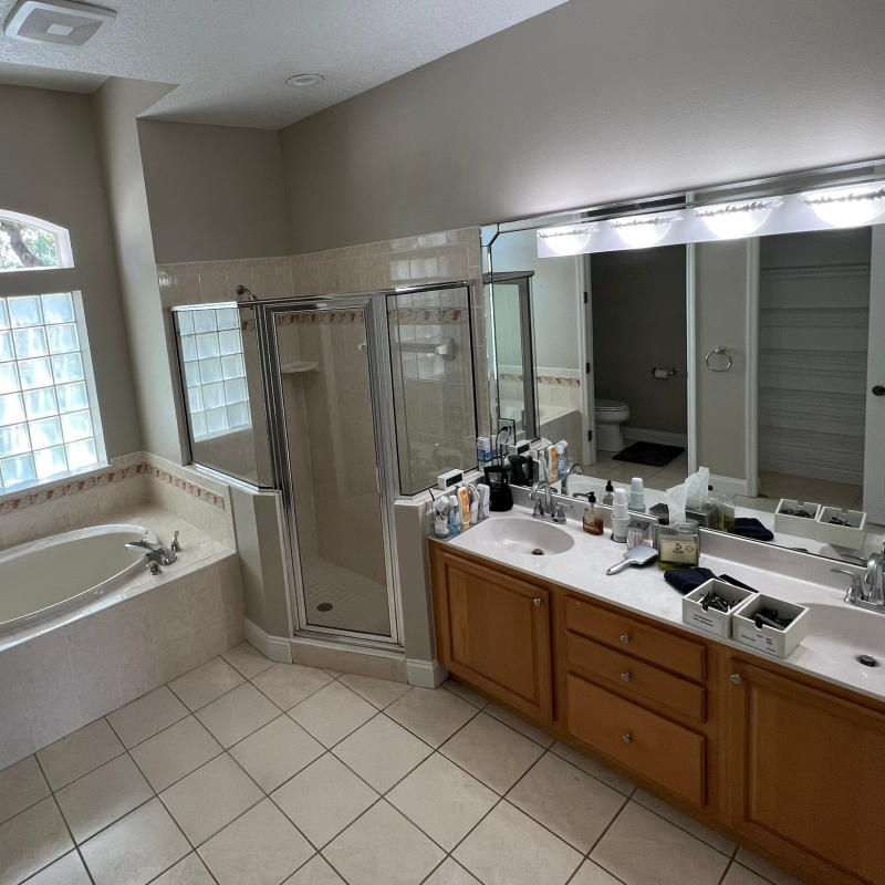 Before - Old Corner Shower with Framed Glass Door