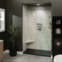Crema Marfil InnovaShower with a InnovaStone matte black bases center drain