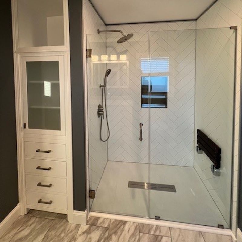 AFTER - shower replacement project - white herringbone wall panels