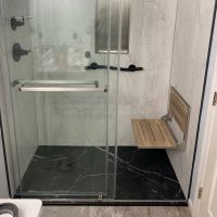 Bianco Marble Waterproof Laminate Wall Panels with Black Marble InnovaStone Base