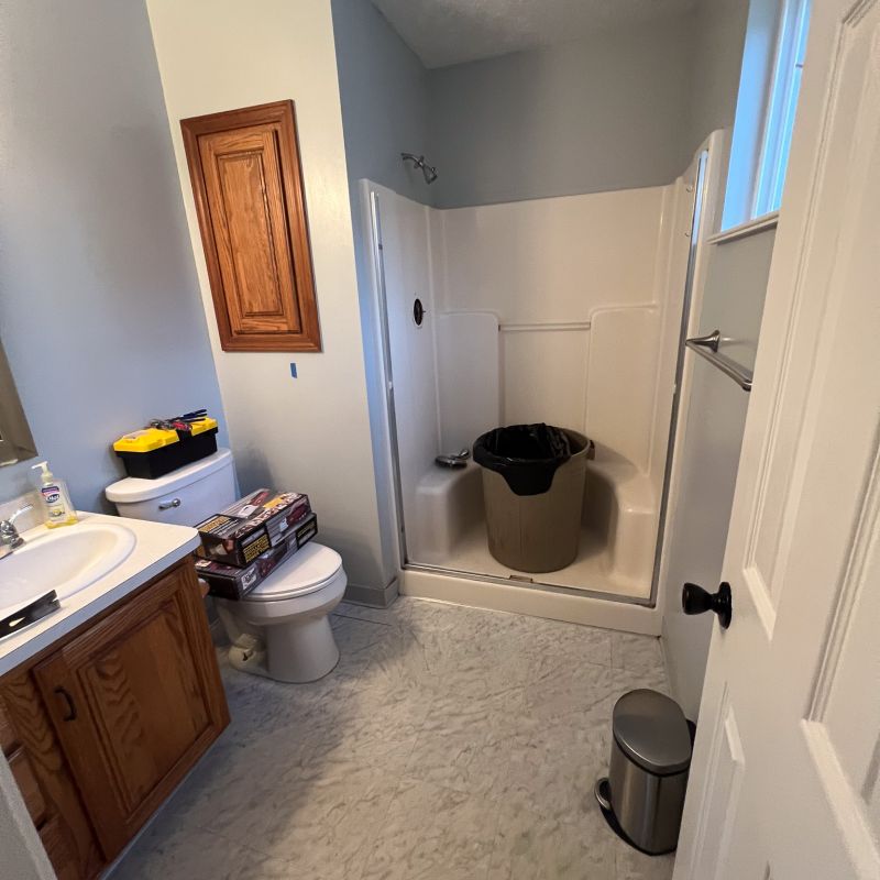 BEFORE - outdated shower replacement project in Cleveland Heights