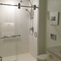 60 x 36 white cultured granite shower pan with a sliding glass door - Innovate Building Solutions 