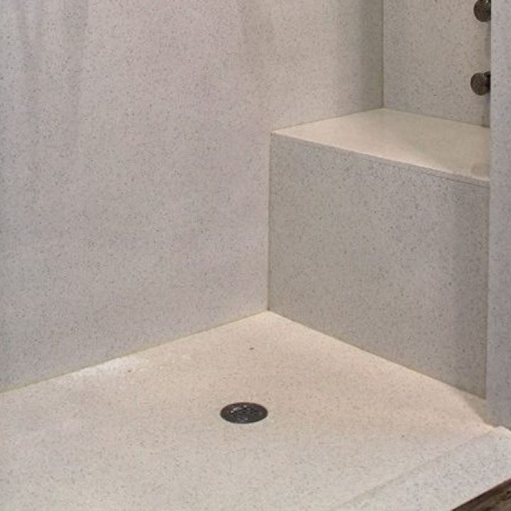 White and gray custom cultured marble shower pan 60 x 36 size with a center drain - Innovate Building Solutions 