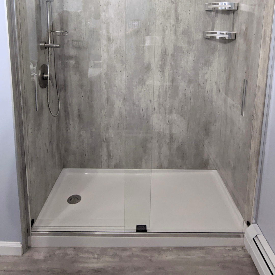 Alcove shower remodel with a pivoting glass door and 60 x 36 acrylic shower pan in Pepper Pike - The Bath Doctor 