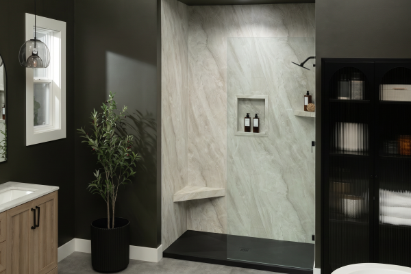 Black marble shower pan and grout free walls in a modern bathroom