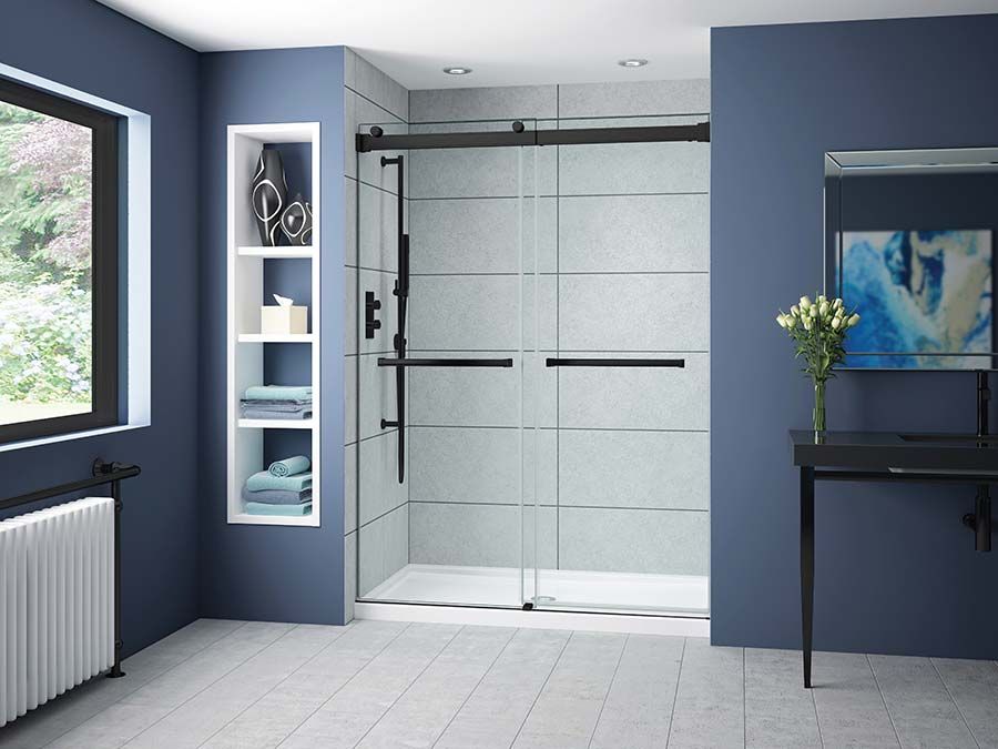 Matte black shower alcove glass bypass doors in a remodel and shower base in Cleveland Ohio - The Bath Doctor 