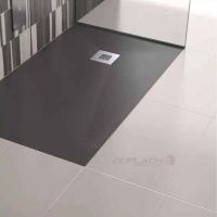 Accessible matte black shower pan flush with bathroom floor