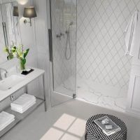 White marble shower pan in modern bathroom