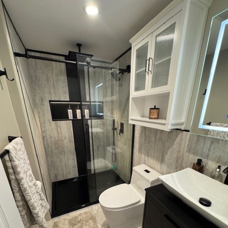 AFTER - Antique Grey with Black Accent Panel in Shower Replacement Project