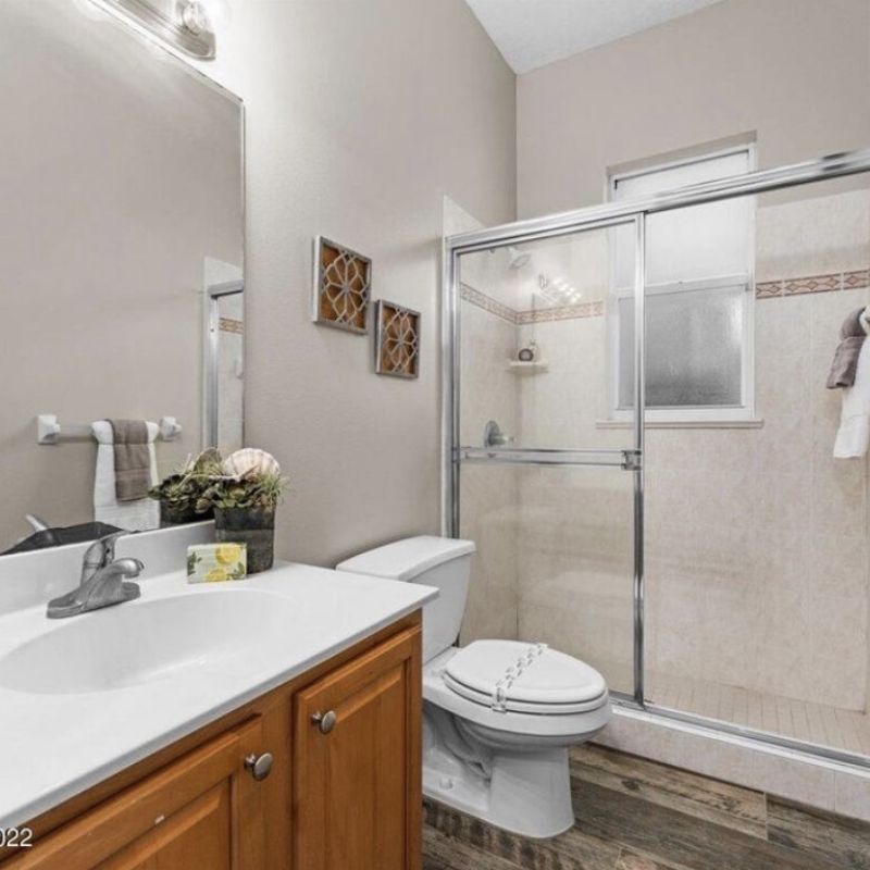 Before - Acrylic Shower Surround with Framed Glass Door