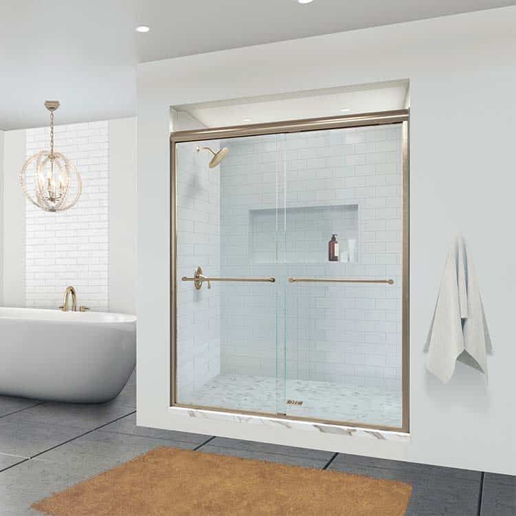 Semi-frameless shower door in brushed gold