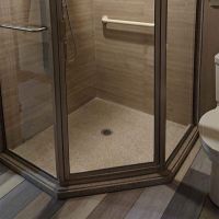 NEO beige cultured granite shower pan with a centered drain with laminate shower wall panels- Innovate Building Solutions