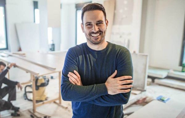 Smiling man remodeling contractor