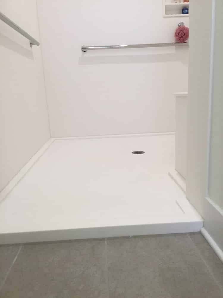 Custom walk in shower pan in a white matte finish 