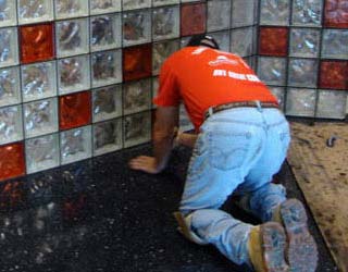 Grouting process (can use sanded or urethane grout between glass blocks - urethane yields better long term results)