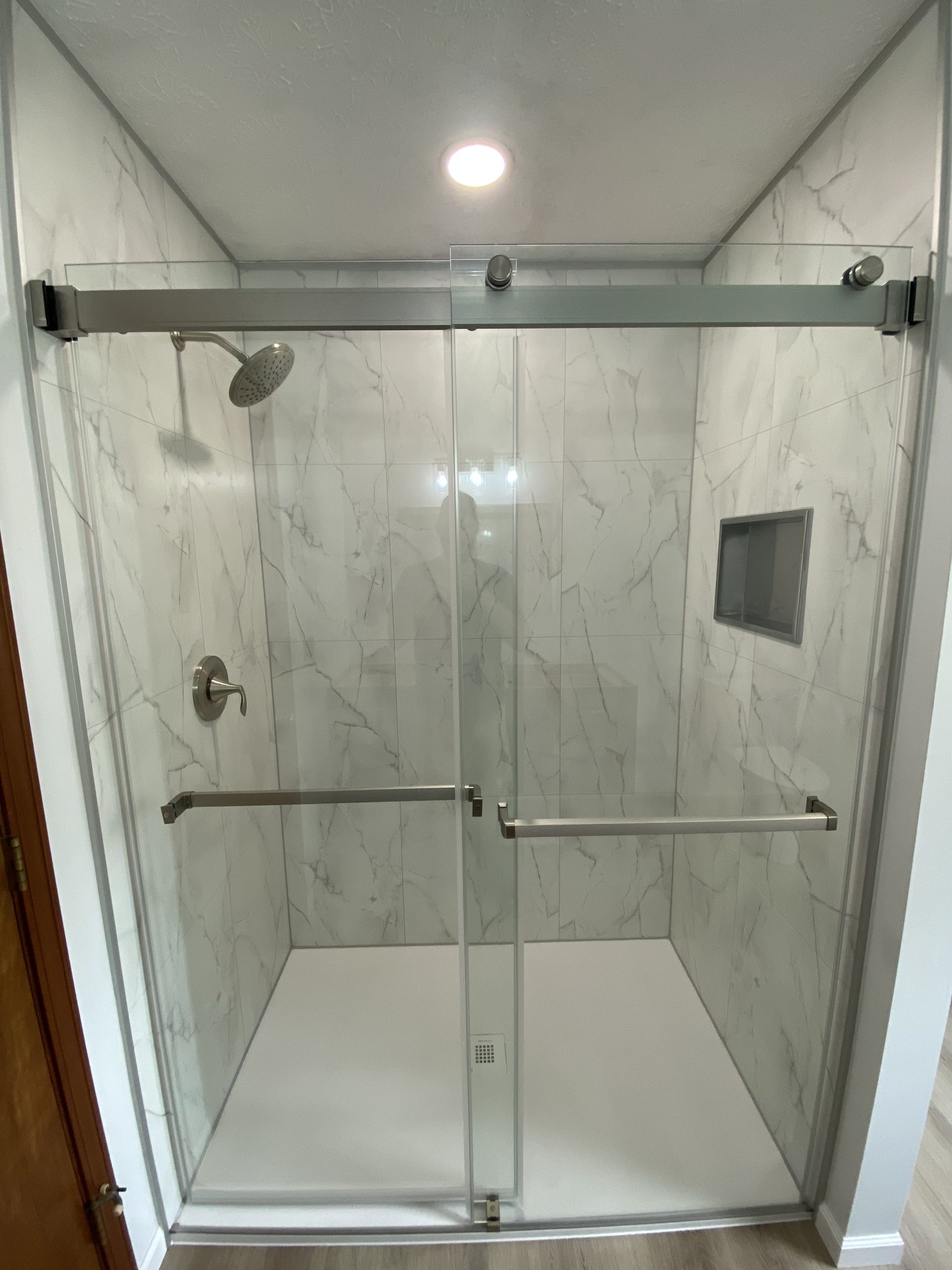 Sliding glass shower door kit with wall panels and shower base