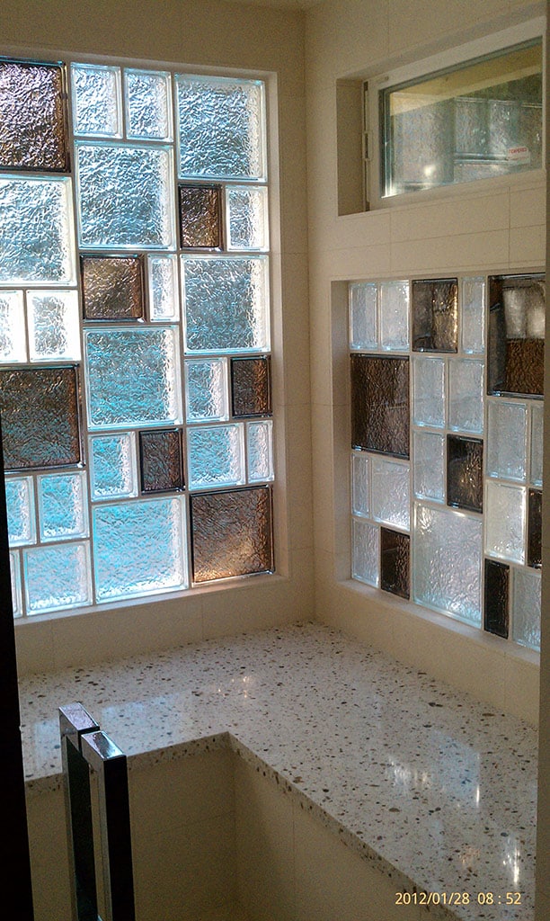 Brown colored glass blocks with various sizes in a shower - Innovate Building Solutions 