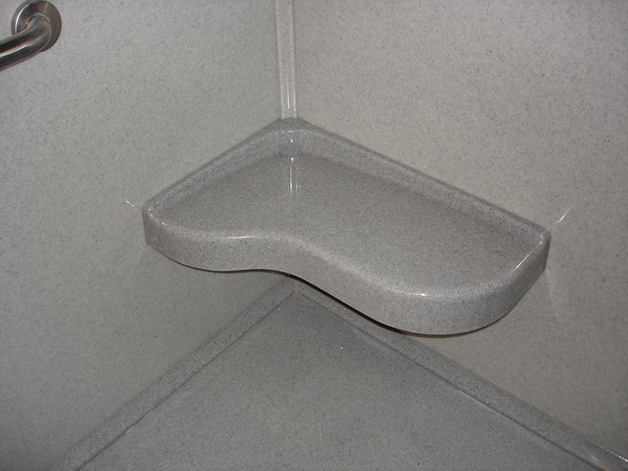 Rounded extended solid surface corner seat 18