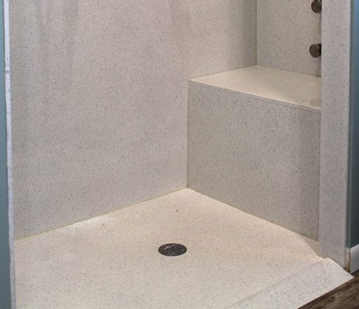 White and gray custom cultured marble shower pan 60 x 36 size with a center drain - Innovate Building Solutions 