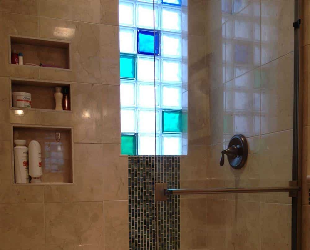 Glass block shower window with blue and green color glass blocks - Columbus Glass Block division Innovate Building Solutions 