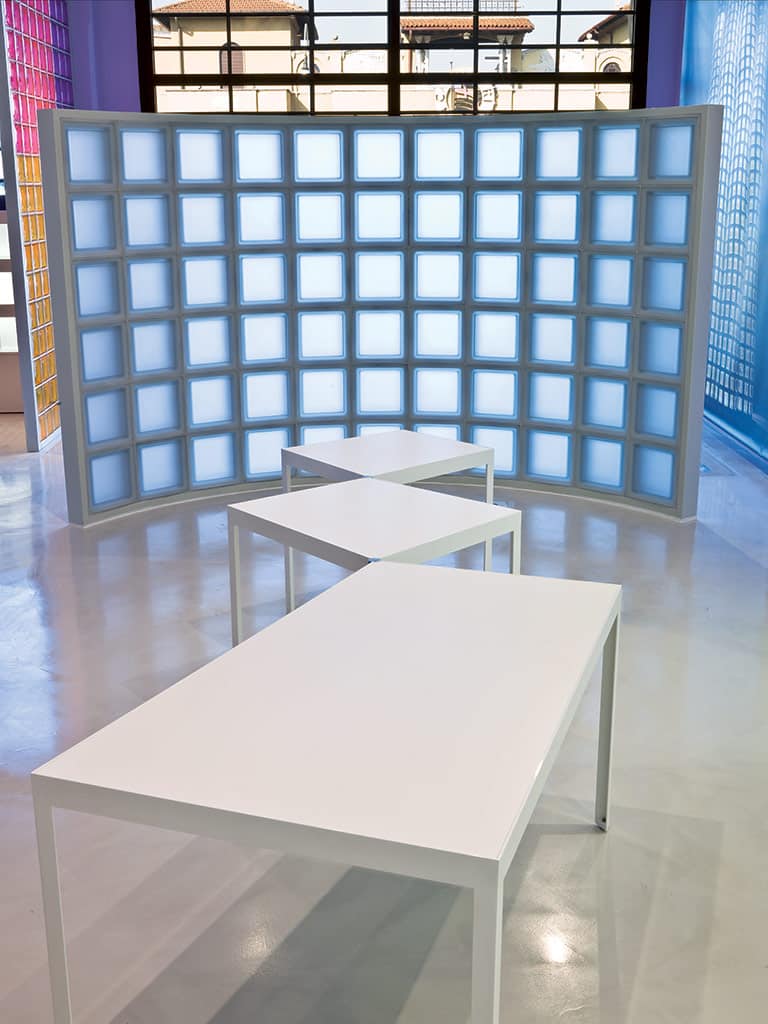 Blue frosted glass block free standing wall in a contemporary office - Innovate Building Solutions 