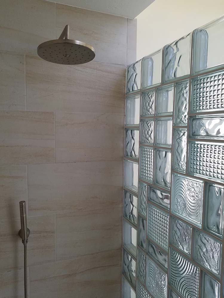 Multi-size glass block shower wall using 4 x 8, 6 x 6, 6 x 8 and 8 x 8 blocks - Innovate Building Solutions 