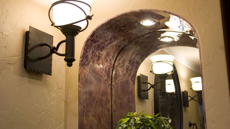 Brecchia paradiso PVC panel bent around an arched opening 