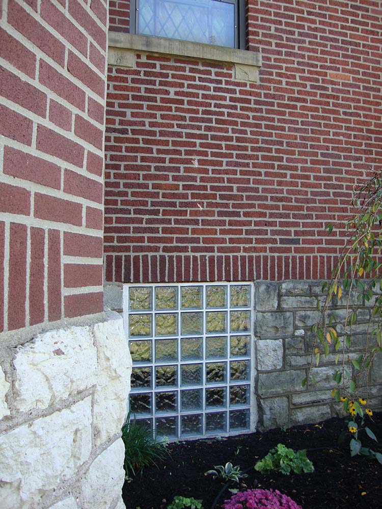 Glass block basement windows in a home gym 